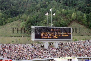 The giant screen displays a message of declaration of the opening