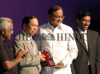 Union Minister for Finance P Chidambaram 2nd right handing over