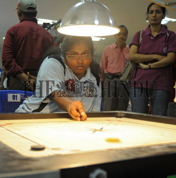 World Carrom Champion S. Ilavazhagi participating in the CMR 9th  Inter-Zonal Carroms Championship in... | The Hindu Images