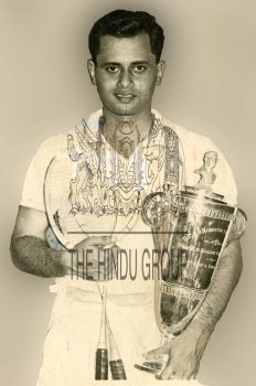 Nandu Natekar, who won the Maharashtra State Badminton championship for the eighth time, with his... | The Hindu Images